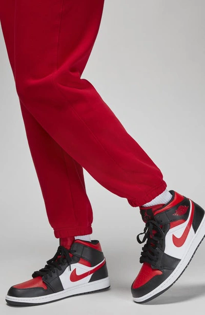 Shop Jordan Brooklyn Fleece Sweatpants In Gym Red
