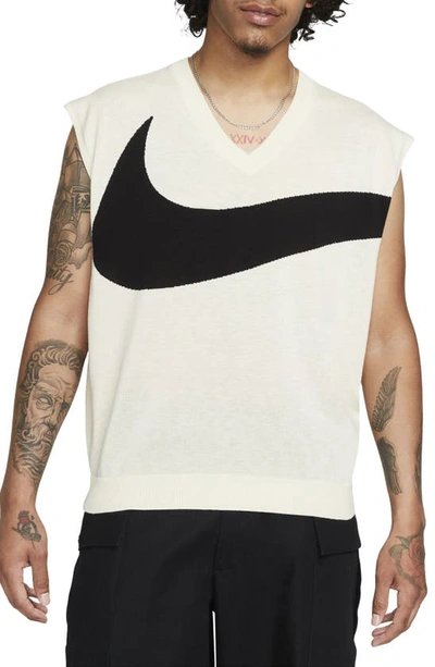 Shop Nike Swoosh Graphic Sweater Vest In Coconut Milk/ Black