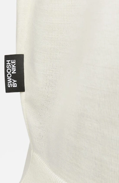 Shop Nike Swoosh Graphic Sweater Vest In Coconut Milk/ Black