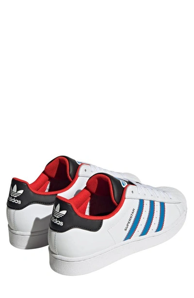 Shop Adidas Originals Superstar Lifestyle Sneaker In White/ Bright Blue/ Red