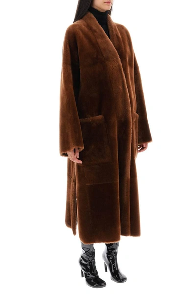 Shop Blancha Long Shearling Coat In Brown