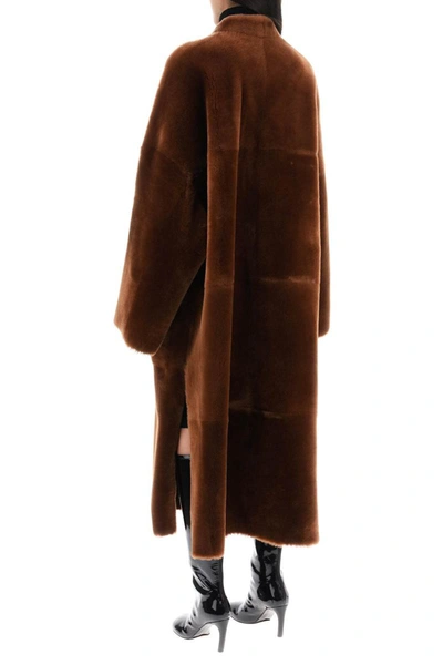 Shop Blancha Long Shearling Coat In Brown