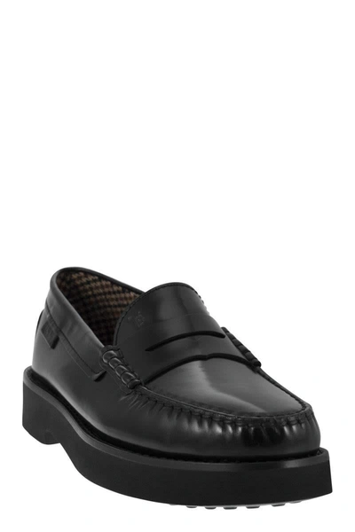 Shop Tod's Leather Moccasin With Rubber Bottom In Black