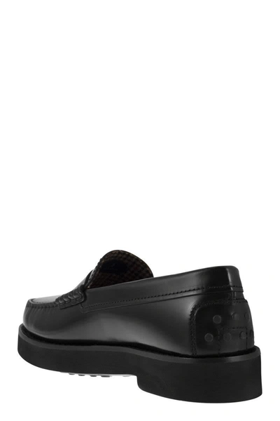 Shop Tod's Leather Moccasin With Rubber Bottom In Black