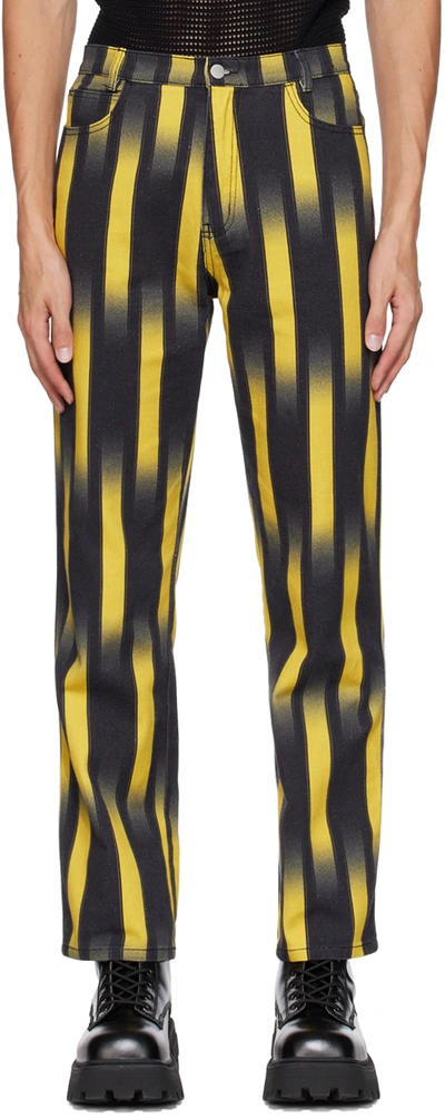Shop Double Rainbouu Black & Yellow Party Jeans In Ghost Stripe Yellow