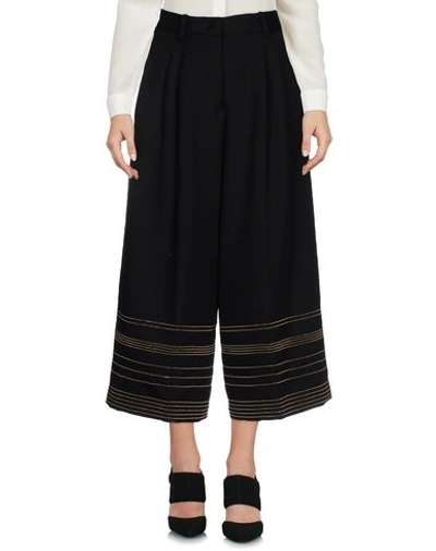 Shop Roberto Cavalli Cropped Pants & Culottes In Black