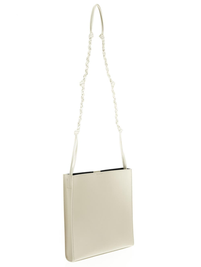 Shop Jil Sander Medium Tangle Crossbody Bag In Ivory