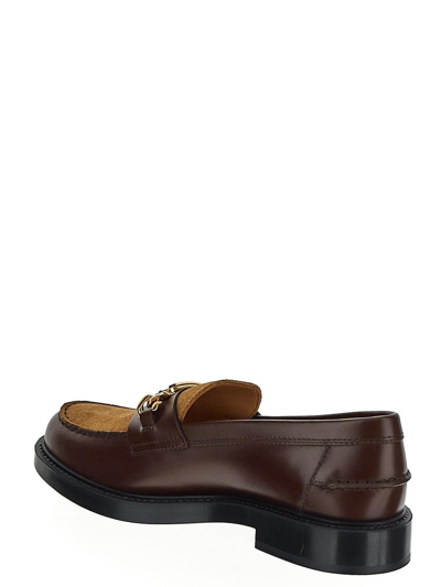 Shop Tod's T-chain Accessory Loafers In Brown