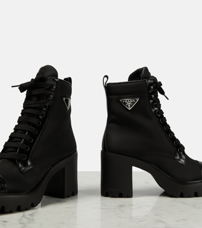 Shop Prada Leather-trimmed Lace-up Boots In Black