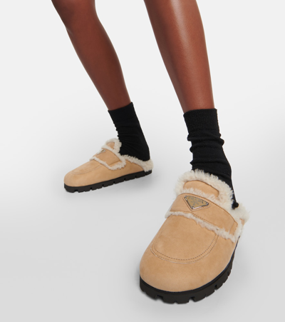 PRADA FAUX SHEARLING-LINED SUEDE SLIPPERS 