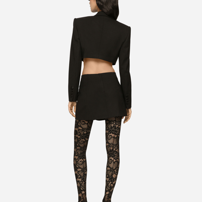 Shop Dolce & Gabbana Twill Mini Wrap Skirt In Black