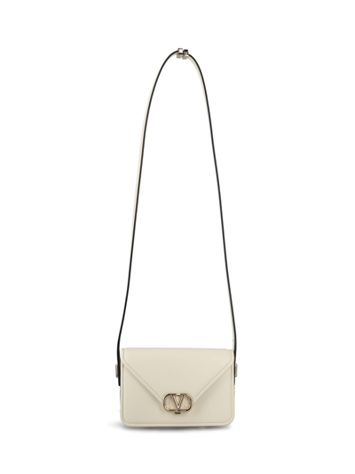 Shop Valentino Logo Plaque Foldover Top Small Shoulder Bag In White