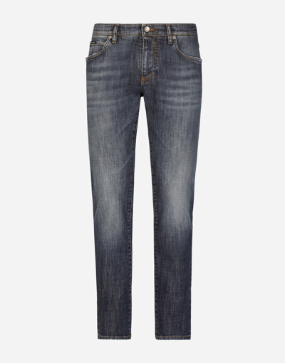 Shop Dolce & Gabbana Slim Fit Washed Stretch Jeans With Subtle Abrasions In Multicolor