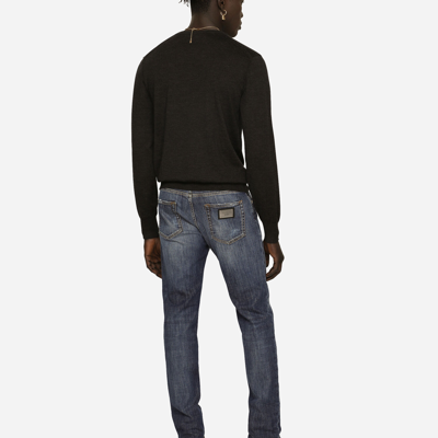 Shop Dolce & Gabbana Slim Fit Washed Stretch Jeans With Subtle Abrasions In Multicolor