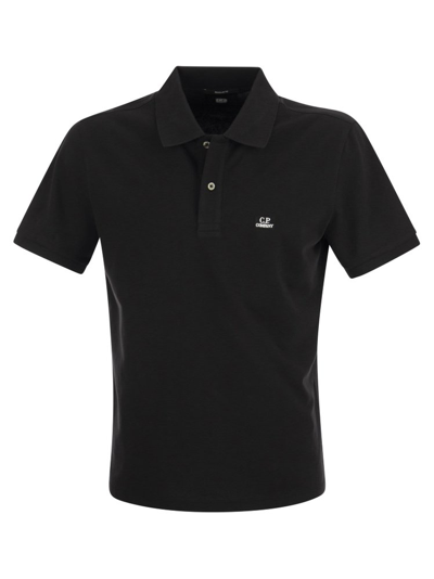 Shop C.p. Company Logo Patch Short Sleeved Polo Shirt In Black
