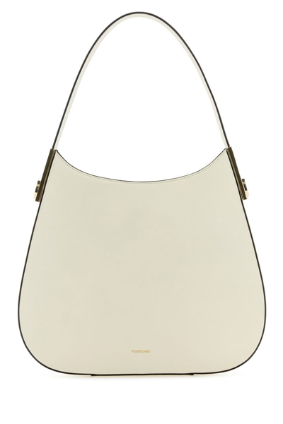 Shop Ferragamo Salvatore  Handbags. In Mascarpone