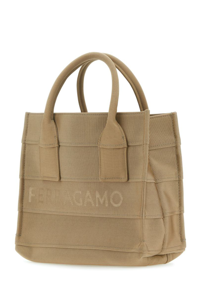 Shop Ferragamo Salvatore  Handbags. In Beige