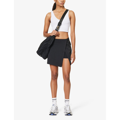 Shop Girlfriend Collective Women's Black Float Split-hem Stretch-recycled-polyester Mini Skort