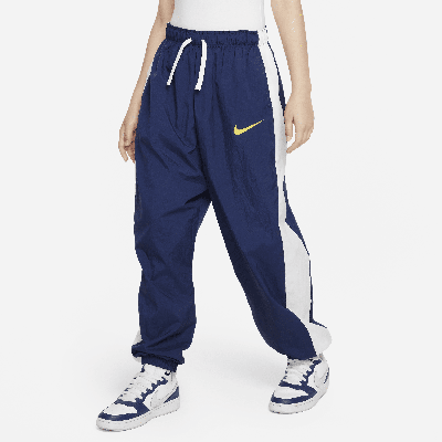 Shop Nike Sportswear Big Kids' (girls') Woven Pants In Blue
