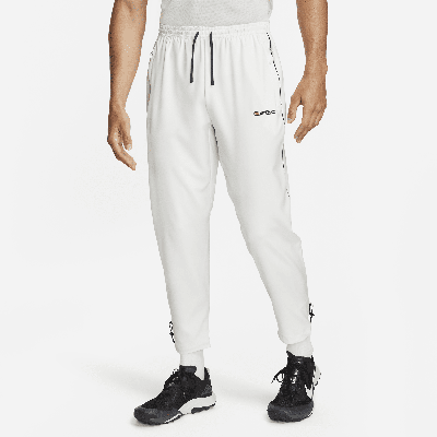 Shop Nike Men's Challenger Track Club Dri-fit Running Pants In White