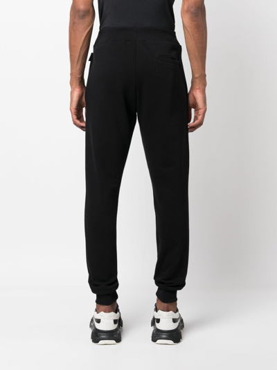 Philipp Plein Graphic-detail Tapered Track Pants In Black