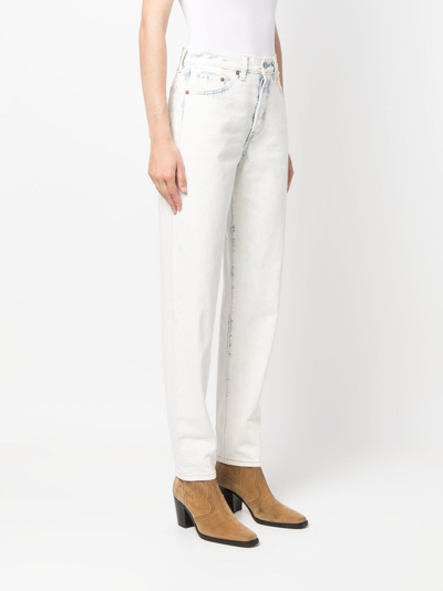 Shop Levi's Bleached-effect Tapered Jeans In White