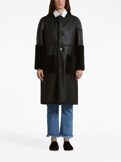 Shop Marni Reversible Shearling Coat In Black