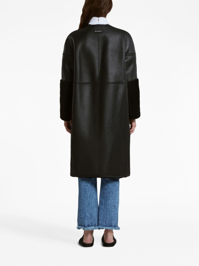 Shop Marni Reversible Shearling Coat In Black