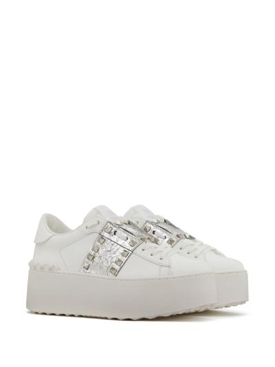 Shop Valentino Rockstud Untitled Metallic Flatform Sneakers In White