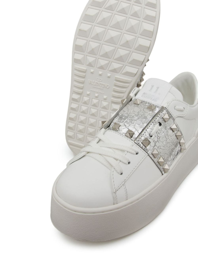 Shop Valentino Rockstud Untitled Metallic Flatform Sneakers In White