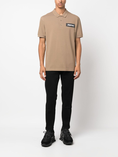 Shop Moschino Logo-patch Cotton Polo Shirt In Neutrals