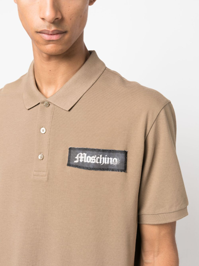 Shop Moschino Logo-patch Cotton Polo Shirt In Neutrals