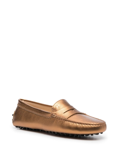 Shop Tod's Metallic-finish Leather Loafers In Gold