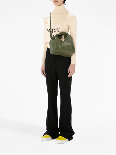 Jw Anderson Flared Trousers In Black