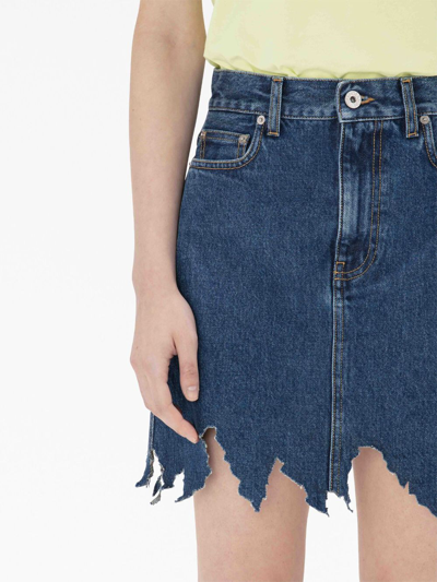 Shop Jw Anderson Lasercut Frayed-hem Denim Skirt In Blue