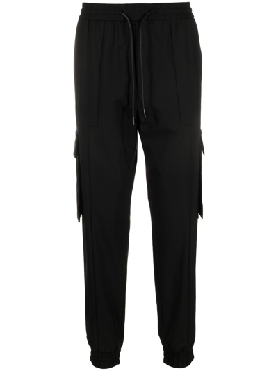 Shop Juunj Tapered-leg Track Pants In Black