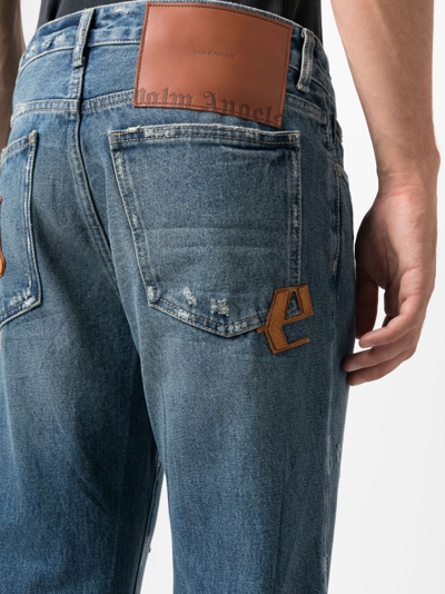 Shop Palm Angels Logo-patch Regular Jeans In Blue