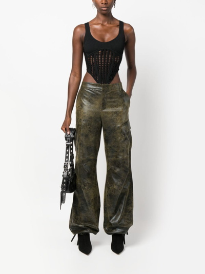 The Andamane Distressed-effect Tapered Trousers In Black