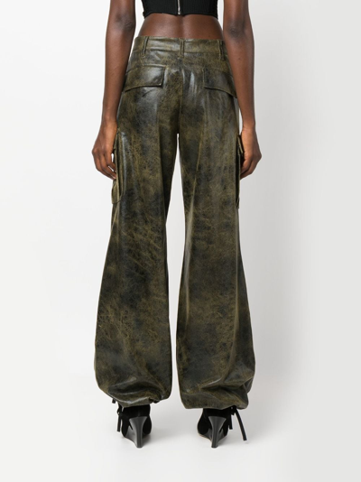 The Andamane Distressed-effect Tapered Trousers In Black