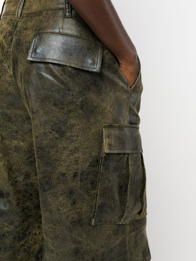 The Andamane Distressed-effect Tapered Trousers In Black