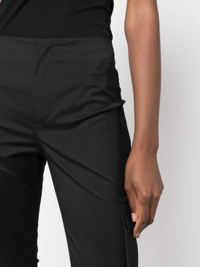 Shop Philosophy Di Lorenzo Serafini Cargo-pocket Flared Trousers In Black