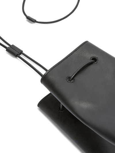 Shop Jil Sander Drawstring-fastening Leather Shoulder Pouch In Black
