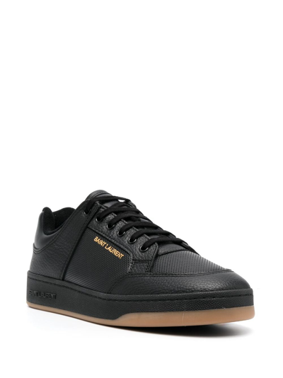 Shop Saint Laurent Sl/61 Leather Perforated Sneakers In Black