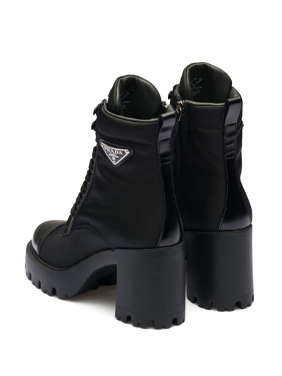 Prada Monolith Leather And Nylon Ankle Boots In Black