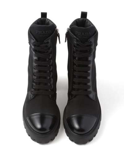 Prada Monolith Leather And Nylon Ankle Boots In Black