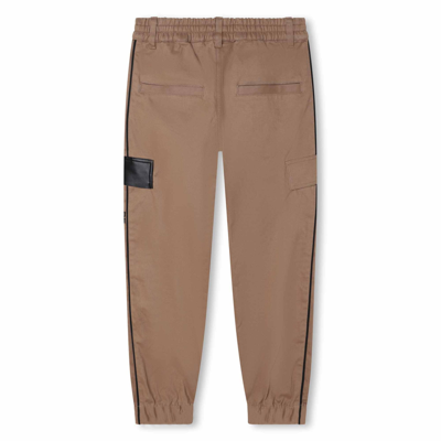 Shop Givenchy Trousers With Logo In Beige