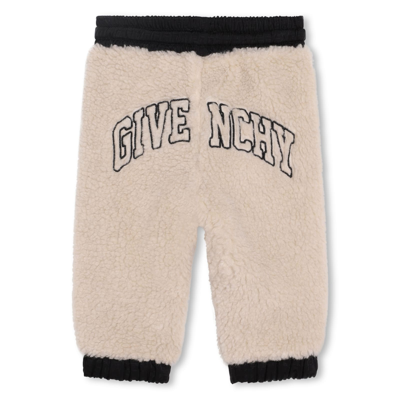 Shop Givenchy Trousers With Print In White