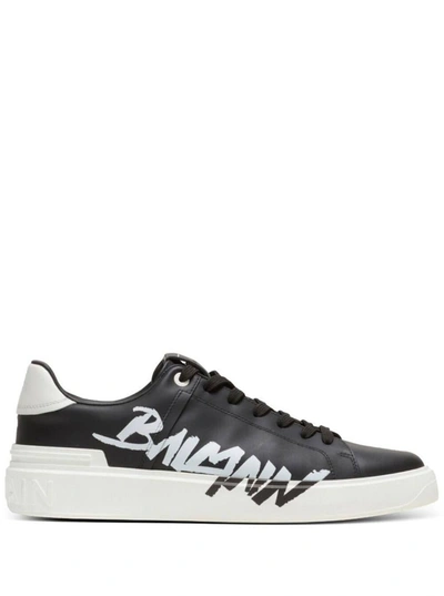 Shop Balmain 'b Court' Black Low Top Sneakers With Contrasting Logo Print In Leather Man