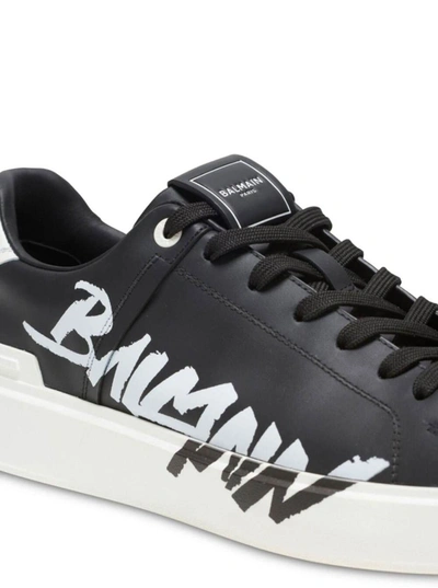 Shop Balmain 'b Court' Black Low Top Sneakers With Contrasting Logo Print In Leather Man