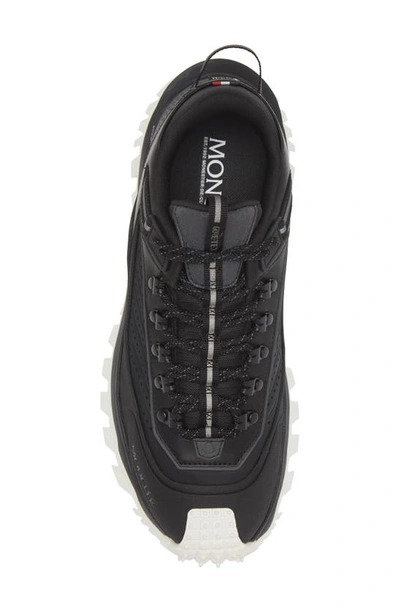 Shop Moncler Trailgrip Gore-tex® Waterproof Low Top Sneaker In Black